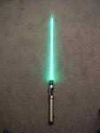 This saber has a p4 green led, 1" thansparent white thin walled blade with 6" of cellophane inside.