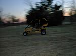 My little bro on his go cart